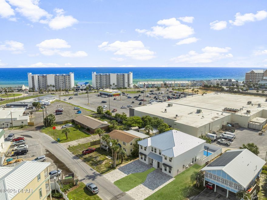 **CURRENTLY UNDER CONTRACT, SELLER WILL CONSIDER BACKUP OFFERS**
Brand-New Custom-Built Duplex - No HOA, Prime Location, High Rental Potential!

Discover this stunning new construction duplex just a short walk to the beach, shops, and top-rated restaurants—no HOA dues and incredible flexibility for use! Whether you're looking for a luxury beach retreat, a high-performing short-term rental, or both, this property delivers.

Each side of the duplex features 4 spacious bedrooms, 4.5 bathrooms, and a bright open floor plan that seamlessly flows to your private saltwater pool, pergola-covered patio, and outdoor hot/cold shower—perfect for entertaining or unwinding in style.

Built for efficiency and durability, the home includes:
    •    Hurricane-impact windows and doors
    •    Spray foam roof-deck insulation
    •    Tankless gas water heater
    •    Dual A/C units per side
    •    Taexx in-wall pest control system
    •    1-year builder's warranty + transferable 1-year termite bond

With high rental income projections, this duplex is ideal for investors. Each unit has its own address and can be purchased individually or together—offering up to 8 bedrooms, 10 bathrooms, and 4,735 total square feet of luxury coastal living.

This is more than a home—it's a rental powerhouse and beachside escape in one. Don't miss this rare opportunity!

**All measurements are approximate and should be varied if important.**