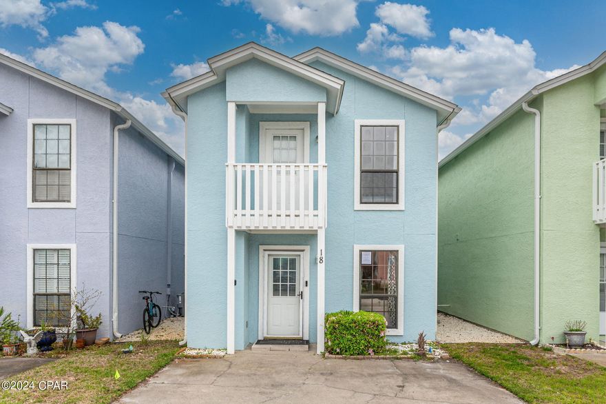 Are you looking for that perfect beach getaway or a place by the beach to call home?  Well, look no further.  This adorable two-story townhome is nestled minutes from the pristine shores of Panama City Beach.  This townhome offers the perfect blend of coastal living and modern luxury, making it an ideal retreat for those seeking a slice of paradise.  This meticulously updated townhome boasting brand new floors, stainless steel appliances, and a stylish backsplash in the kitchen, makes this retreat a true gem in the coastal market.

As you enter, you are greeted by the open concept layout the flows seamlessly from the living area to the kitchen, creating a bright and inviting atmosphere that is both perfect for relaxing and entertaining.

The beautifully updated bathroom have also bee treated to the sam level of attention with new floors, vanities, and dazzling gold and bronze accents that adorn the fixtures, hardware and accessories throughout the space.  

Upstairs you will find the spacious bedrooms, each offering their own private balcony as well as plenty of closet space whether you plan to make this home your private retreat or permanent residence.  

The first floor also offers a private patio off the kitchen where you can relax with a morning coffee or host al fresco dinners under the stars.  Don't forget to take that 5 minute stroll to the beach for some fun in the sun or your evening stroll along the shoreline enjoying nature's nightly masterpieces.  Don't let another Florida sunset pass you by!  Call for your private tour today!