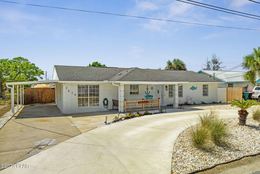 For Lease - 6+ Months Lease Available! Rent Includes: Water/Sewer, Internet, Garbage. Charming 3 BR, 2 BA beach house, fully furnished located in East Panama City Beach with quick access to the public beaches, boat ramps, local restaurants, grocery and Navy Base. Ideal for corporate housing, this home is beautifully decorated with a clean modern feel. As you enter, you'll find an updated, fully stocked kitchen with granite, new cabinetry and coffee/wine bar. The kitchen leads into a cool game room with foosball, mounted TV and sofa. Spacious laundry room with washer/dryer included. The living and dining areas provide comfortable seating with a large TV for the big games or relaxing movie nights. The master suite is accented with a barn door and has a King bedroom set, TV and ensuite master bathroom with custom tile shower. Offering a split bedroom floor plan, the home provides nice privacy with the two additional bedrooms and the hallway bathroom tucked on the side of the home. The best part is the tranquil backyard with privacy fencing, fire pit with seating, and patio including an outdoor dining set. Circular driveway and covered parking make it nice for entering and exiting with multiple vehicles. This is a true gem of a rental property! Call today for a private tour!