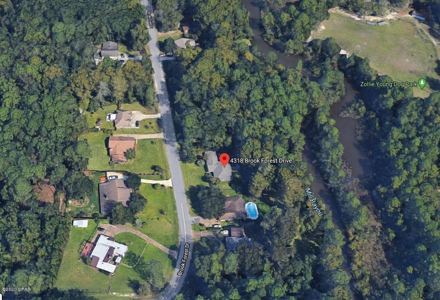 'CURRENTLY UNDER CONTRACT, SELLER ACCEPTING BACKUP OFFERS'

Best deal on the market for a waterfront home with Gulf Access. From the lush landscaping to the sprawling entertaining spaces this home  will have you feeling larger than life. The 4 bedrooms, 2 bathrooms and more than 1,800 sq.ft creates the perfect setting for relaxing and entertaining. Located in the highly sought out family friendly neighborhood of Brook Forest and conveniently located to great schools, shopping, dining, a short commute to the Air Force base, and the beaches. Highlights include a roof installed within the last 2 years, AC and Water heater installed within 3 years, new paint and over half an acre on a canal. As you walk into your new home you'll notice the attention to detail throughout. The spacious kitchen will have you feeling like a master chef with updated stainless steel appliances, tile backsplash, and plenty of storage space.

Tile floors flow through the halls and you'll love the tasteful finishes such as the barn doors and faux beams in the great room. Enjoy gatherings by the wood burning fireplace during the Holiday season or entertain in style on your large back deck. Also enjoy fishing off your new private dock! All bedrooms boast plenty of comfortable living space, study and storage. To say this home is a great deal is an understatement!! Don't wait around on this one or you'll miss this great opportunity!