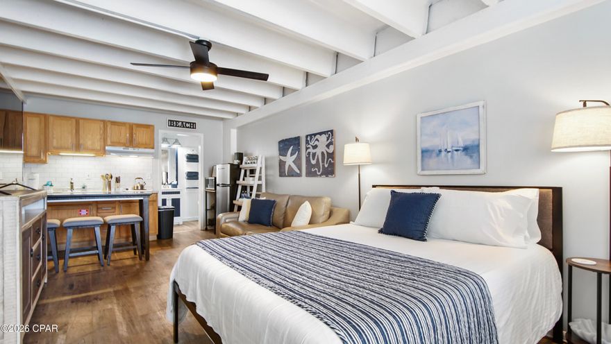 Wake up to the sound of the waves in this beautifully updated beachfront studio condo — the perfect coastal retreat or investment property! With 330 sq. ft. of thoughtfully designed space, this unit offers comfort, style, and exceptional rental potential.

Step inside and find a queen bed and queen sleeper sofa, comfortably accommodating up to three guests. The kitchenette features a full-size refrigerator, cooktop, microwave, and all the essentials for convenient in-unit dining. The bright, open layout is accented by upgraded shutters framing the double window, inviting in natural light and gorgeous gulf views.

Modern touches like a newer PTAC unit ensure efficient heating and cooling for year-round comfort, while the well-appointed full bathroom completes this smartly designed space. The building has also been updated throughout the past several years, including a full-building structural renovation and new roofs on both the 5th and 7th floors.  Documents including the Phase 1 Milestone Inspection Passed Report and SIRS Study are available as well.  

Located just steps from the sand, this condo offers immediate access to sun, surf, and seaside dining — and it's already operating successfully as a short-term rental. Whether you're looking for a profitable vacation rental or your own coastal escape, this turnkey unit delivers.  The owners are licensed Realtors in the State of Florida.