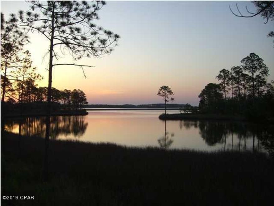 Amazing opportunity to build your dream home on this waterfront Lot in RiverCamps. It is 1.09 acres with unobstructed views of Crooked Creek on out to West Bay and is located on a cul de sac!

RiverCamps is a 1500 acre, gated, waterfront community that will have 450 homes when completely built-out. With 1000 acres dedicated to preservation there are 7 miles of trails, a private boat ramp, day use boat slips, dry boat storage, zero entry pool, fitness room, kayaks, canoes, paddle boards and bikes for residents! 

Don't miss out on owning one of the few remaining waterfront Lots with NO build-out time.