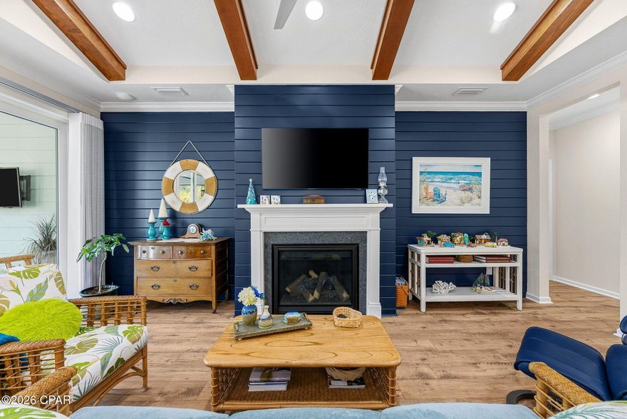 Motivated Sellers Alert: Turnkey Luxury Cabana on Premium Preserve Lot in Latitude Margaritaville Watersound!

Why settle for new construction waits, inferior lots, or endless upgrades when this stunning Cabana (Beach Collection single-family floor plan) delivers it all--2,394 sq ft of elevated coastal elegance, ready for immediate move-in?

Nestled on a coveted premium preserve lot in fabulous Phase Five, this home backs to lush, wildlife-rich green space for ultimate serenity and privacy. A sleek paver driveway leads to the 408 sq ft 2-car garage, equipped with whole-house water filtration, built-in shelving, durable polyurea flooring, and pull-down attic stairs for smart storage.

Inside, the open Great Room captivates with vaulted beamed ceilings, a striking tongue-and-groove accent wall, custom paint, and a cozy gas fireplace--ideal for gatherings and sunset toasts. The gourmet kitchen impresses with quartz countertops, designer tile backsplash, 42'' crown-molded cabinetry, under-cabinet lighting with valance, and a custom island kick wall that ties everything together seamlessly.

The lavish primary suite is your personal retreat: tray ceiling, bay-windowed sitting area with abundant light, custom wainscoting accent wall, and spa-like bath featuring tongue-and-groove details, designer fixtures, and bespoke vanity mirrors. Thoughtful custom organization shines throughout--closets, pantry, laundry, and garage--for effortless, clutter-free living.

Step outside to the extended screened lanai (with bird-caging for bug-free enjoyment), paved in elegant stone and overlooking the peaceful preserve--your perfect spot for coffee, stargazing, or al fresco dining amid nature's soundtrack.

Bonus: A 2023 Evolution HDK Ranger golf cart conveys with acceptable offer terms!

Location perks make life easy: Just 5 minutes by golf cart to the new Watersound West Bay shopping/dining hub, under 10 miles to pristine Gulf beaches (via car or community shuttle), ~15 minutes to Northwest Florida Beaches International Airport, and quick access to top-tier healthcare.

This isn't just a home--it's a personalized escape into the vibrant, Jimmy Buffett-inspired 55+ lifestyle: multiple pools, Fins Up Fitness, on-site dining, live entertainment, pickleball, and endless island vibes.

Motivated sellers are ready to make this dream yours--don't miss the chance to skip the build process and start living the Latitude life today. Schedule your private showing now; opportunities like this preserved-lot gem with premium upgrades move fast!