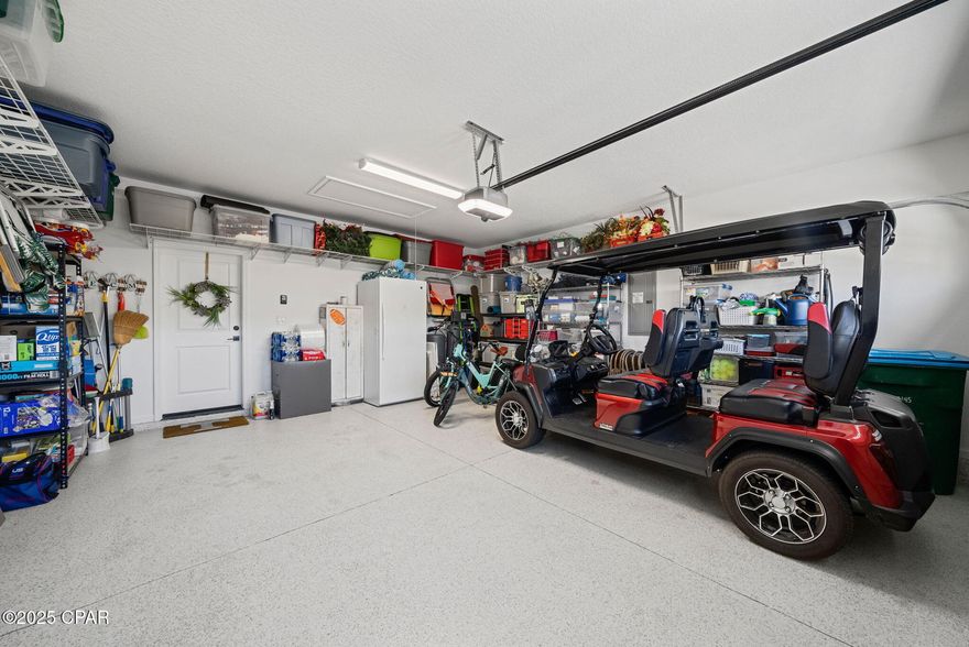 Discover Elevated Coastal Living in Latitude Margaritaville Watersound! 

Elevate your vision of paradise in this stunning Cabana, Beach Collection, single-family floorplan, a 2,394-square-foot retreat that's been thoughtfully transformed with premium builder upgrades and exclusive post-closing luxury enhancements. These custom touches create a one-of-a-kind sanctuary that stands out among its neighbors, blending timeless Margaritaville charm with sophisticated, personalized flair.

Nestled on a coveted premium preserve lot in Fabulous Phase Five, this home invites you into a world of natural serenity and modern convenience. 

A sleek paver-stone driveway guides you to the 2-car garage (408 square feet), outfitted with a whole-house water filtration system, built-in storage shelving, durable polyurea flooring, and convenient pull-down attic stairs for effortless organization.

Step inside to the heart of the home: a breathtaking Great Room where vaulted ceiling beams and a striking tongue-and-groove accent wall draw the eye upward, complemented by bespoke wall colors and a cozy gas fireplace. It's the perfect gathering space for sunset toasts and lively conversations, all under a canopy of coastal elegance.

The gourmet kitchen is a chef's dream, featuring lustrous quartz countertops, a designer tile backsplash, 42-inch cabinetry with elegant crown molding, and soft-glow under-cabinet lighting framed by a valence. At its center, a spacious island shines with a custom tongue-and-groove kick wall that echoes the Great Room's accents, turning meal prep into a seamless, stylish affair.

Retreat to the lavish master bedroom suite, where a trimmed tray ceiling and bay-windowed sitting area flood the space with light and tranquility. Custom wall colors and an exquisite wainscoting accent wall add layers of warmth and sophistication, making it your private oasis.

The adjoining master bathroom exudes spa-like serenity with its tongue-and-groove accent wall, designer light fixtures, and bespoke vanity mirrors--every detail crafted for effortless indulgence.

Storage is elevated throughout, with custom organizational systems in the closets, pantry, garage, and laundry room, maximizing every inch for clutter-free living.

And that's just the beginning--countless additional interior upgrades await discovery, best experienced in person to truly appreciate their artistry and impact.

Unwind outdoors on the extended, screened lanai (complete with bird-caging for pest-free bliss), paved in elegant stones and framed by the lush, wildlife-rich preserve. It's your front-row seat to nature's symphony, ideal for morning coffee or evening stargazing.

Included with acceptable offer terms is the 2023 Evolution HDK Ranger Golf Cart. 

Prime Location, Endless Adventures: Glide just 5 minutes by golf cart to the exciting new Watersound West Bay shopping center. Embrace the Gulf's powdery white sands in under 10 miles--via car or the community's shuttle service. Touch down at Northwest Florida Beaches International Airport in less than 15 minutes, and access Tallahassee Memorial Healthcare's state-of-the-art Primary Care campus with ease.

Seize Your Slice of Margaritaville Magic: Why wait for new construction delays and inferior lots when this turnkey gem lets you dive into the laid-back lifestyle right now? Revel in the community's world-class amenities--from pools and fitness centers to live music and beach vibes--while basking in Florida's golden sunshine and peaceful preserve views. With its unparalleled upgrades, this home isn't just a property; it's your personalized portal to joy. Schedule your private tour today and make the dream yours--before it's gone!