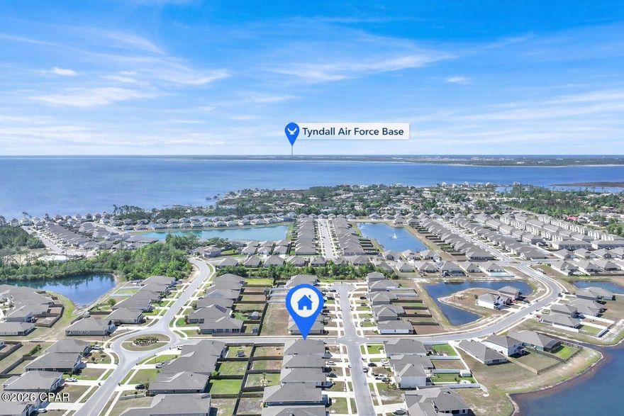 This 5 Bedroom 3 full bath home is over 2550 sq ft and sits on a huge corner lot located in one of the most desirable neighborhoods in Panama City!  An open floor plan is the heart of the home with a spacious kitchen including stainless appliances, a walk in pantry, granite, and a beautiful island overlooking an enormous living room. This property has a fenced in back yard, 2 car garage and is equipped with an IQ smart home system. Take a stroll through landscaped trails to your community pool! This location is central and just minutes to Tyndall Air Force Base, Gore Park with walking, recreation and a boat ramp, Mexico Beach and Pier Park! Call today to schedule a tour, this amazing 2022 home is priced to sell! There is also a VA assumable loan at 4.75%!