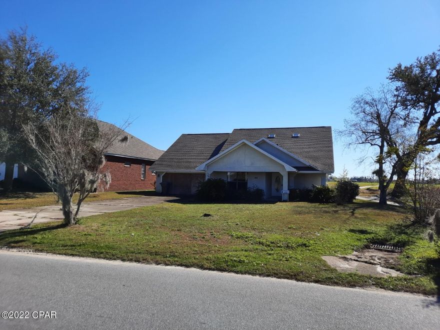 Great Home in desirable Panama City Country Club. Home has a brand new roof but is in need of inside remolding, other similar homes sell for $420K Investors welcome !!!