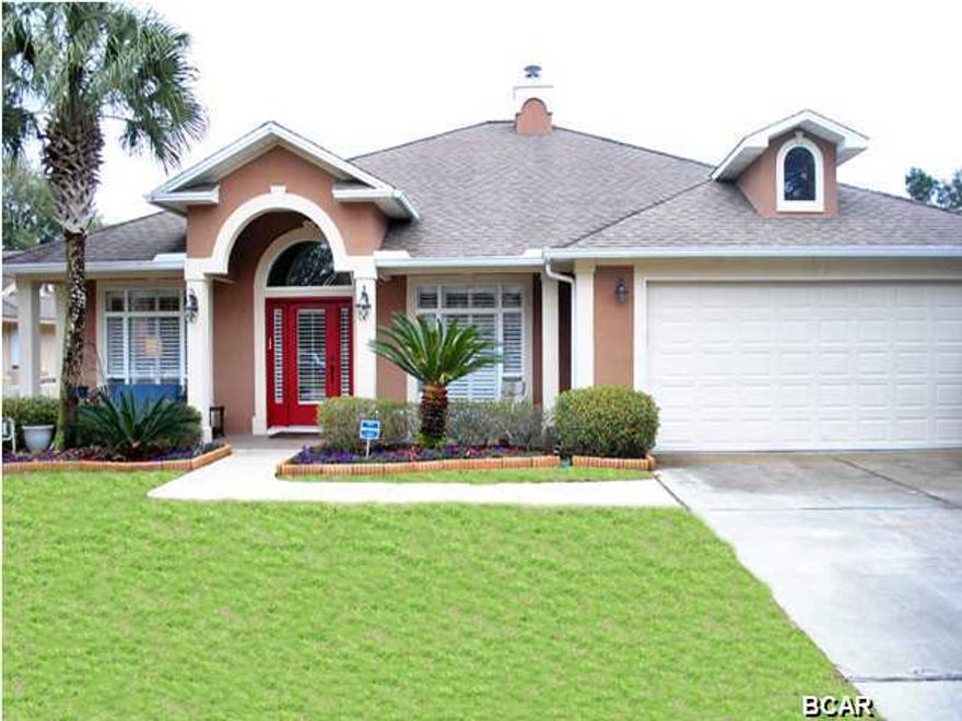 Elegantly remodeled executive home on the 15th fairway of Meadows Golf Course in the gated Community of Bay Point. Astonishing entrance leads you to the foyer and directly into the open floor plan of the great room with fireplace, bamboo hardwood flooring, and cathedral ceilings. Immediately to the right is a bonusr room which is currently an office and easily a fourth bedroom. The great room overlooks the pristine heated pool with a new large lanai (55X17) which covers the complete back yard. Custom bamboo hardwood flooring through and large kitchen with granite counter tops, large breakfast bar, and plenty of cabinetry. Formal dinning area sits next to kitchen with great views of pool. Home features split bedrooms (large bedrooms with walk-in closets) and large master bedroom,