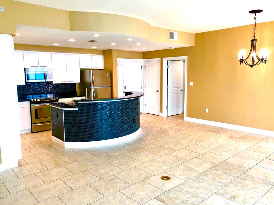 For those with discerning taste, seeking the perfect full time residence or luxurious second home, Marina Landing provides everything you've ever dreamed of. This recently upgraded 2 bedroom provides almost 1,400 feet of living space and features true floor to ceiling windows through-out the entire residence with amazing views of the pristine St. Andrews Bay from every room. Add in the expansive balcony that features a stainless outdoor kitchen and that provides you with an incredible 500 feet of outdoor living space that is perfect for entertaining family and friends, you have the perfect home! The Chef inspired Kitchen offers upgraded stainless steel appliances and an abundance of cabinetry, with 3cm granite throughout the kitchen and a functioning wrap-around breakfast bar that is perfect for family and friends gathering. Featuring two oversized bedrooms and bath, the Master Bedroom Suite comes with a full walk-in closet, luxury master bath with separate shower and extra deep soaking tub great for those bubble baths! The second bedroom has a walk-in closet and full bath. This spectacular property has a state of the art deep water marina on site and is only minutes to the pass and the Gulf! Marina Landing is a boat lovers dream come true. Marina Landing also features a beautiful bay front pool and hot tub with tropical landscaping, quiet sitting areas, conference room, and health & fitness center. Just minutes to the white sandy beaches and right down the street from Pier Park, this spectacular property provides both the perfect location and the perfect lifestyle... If you haven't visited Marina Landing before now, you owe it to yourself to take a look!