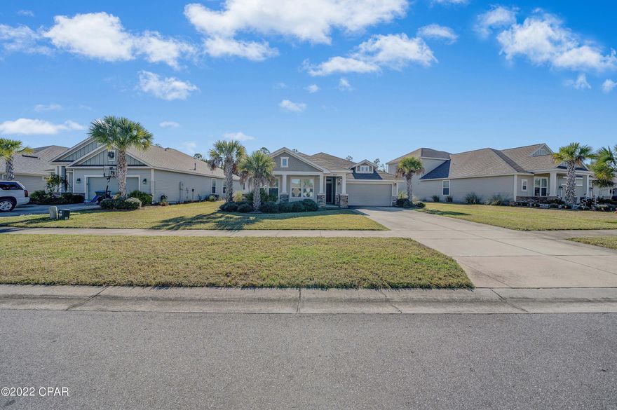 Seller has just replaced over 90% of  ductwork & vents! Split Plan! This large 4 bedroom, 2 bath home is located on a premium lot in Breakfast Point next to a conservation, preserving tranquility. This is your chance to own a great house built by David Weekley with many upgrades.  Enjoy an extended lanai, a custom fireplace, a bay window in the Master bedroom, & a beautiful kitchen with upgraded cabinets and granite throughout. With an open kitchen and family room layout, this home is perfect for the family looking for their dream home. Breakfast Point is also located in one of the best school districts in the area. Don't miss this opportunity to have a great lot and a fabulous home in one of the favorite neighborhoods at the beach!