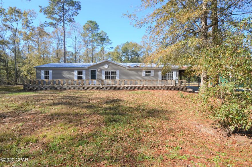 Over 7 acres in a convenient location.  Enjoy the proximity to town, but also the peace and quiet that country living provides.  This property features two double wide mobile homes (one move in ready!).  The property also features a 24x36 barn with concrete slab and lean to.  The move in ready home features four bedrooms and two baths plus office.  The front has a large deck, and the back of the home features a nice screened porch.  This home has fresh paint and new floor covering throughout.  The living area is open and features a gas fireplace.  The kitchen has new stainless appliances and access to both the dining area, as well as breakfast nook.  The other mobile home features a metal roof with newer ac unit, but the interior needs work.  This property is a must see!