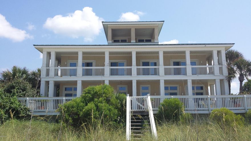 Here is a golden opportunity for a large beach home on the “World’s Most Beautiful” beaches. This luxury home is actually a duplex with mirroring floor plans. Enjoy 4 bedrooms and 5 baths on each side plus a large 3rd floor viewing room, (most suitable for a play room or a man cave). Each home comes fully furnished and has expansive views. The ground floor is wide open with the fully equipped kitchen having beach front views looking over a large family dining area and a huge living room. The large back deck gives direct access to the sand and sunsets. The second floor has four bedrooms, each with their own bathroom and closet. The Master Bedroom and bedroom 1 both have balconies overlooking the shoreline. Ideally located on the west end of the beach, don’t miss this opportunity.