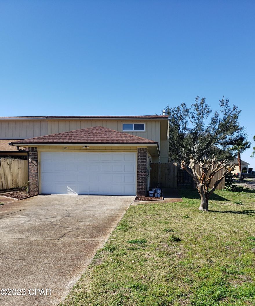 End Unit Rowhome with large corner lot.  Cute 2-bedroom split bedroom plan, 2 bath and 2 car garage.  This home features an open living room/dining area with vaulted ceilings, wood burning fireplace, wood plank marble tile throughout, kitchen has stainless appliances, granite countertops, pantry closet, W/D hookups in the garage, master bedroom/master bath with dressing area and walk-in closet.  Privacy fenced side yard with open patio off the dining area, backed screened in patio with tile floor and is off the living area with view of the bay.  Shed for tenant use.  
The home is ALL ELECTRIC!
1-Small Dog under 20 lbs.
$50 Pet Fee/$250 Pet Deposit/$25 Per Month Pet Rent!