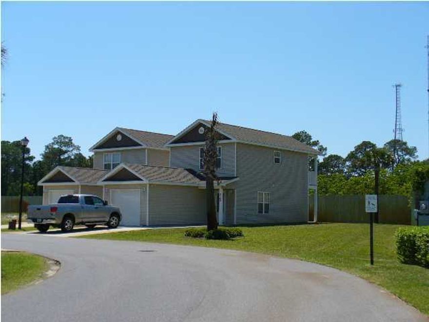 This 2 bedroom 1.5 bath townhome with 1 car garage is located in Sterling Cove. The home features tile floors downstairs,carpeted bedrooms upstairs and extra outside storage space. Washer and dryer included. Yard service provided, community pool.