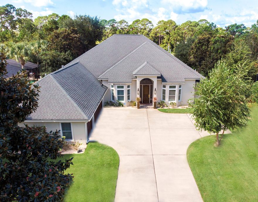 Embrace the lifestyle you have dreamed of.  Revel in this 5 Bdm. 4 Bath sophisticated executive home featuring large master suite, and master bath with huge walk in closet, whirlpool tub, separate shower, two separate dressing areas and stained glass window.  This custom built home is captivating when you first enter the foyer and see the stunning dining room with its unique crystal chandelier and elegant living area.  The gourmet kitchen offers stainless appliances stone counter tops, gas range, tons of cabinets, eat in kitchen area, gas fireplace for kitchen and family room which overlooks the pool. Separate suite made up of two bedrooms with Jack and Jill bath and a 5th bdrm and bath used as  the owners office.  The abundance of conveniences includes an expansive LANAI completely encomp assed by a posh screened outdoor entertaining area with a heated salt water pool with a lovely waterfall which enhances the concept of indoor/outdoor living.  Looking out at the 14th tee box on Bay Point's Nicklaus Golf Course separated by one of  the most beautiful enormous ponds in Legend Hills, is a SINGLE story DREAM home.  Hurricane Michael is allowing you to have a BRAND NEW ROOF.  If you buy early enough you can pick out the color.  Sq. ft. approx.