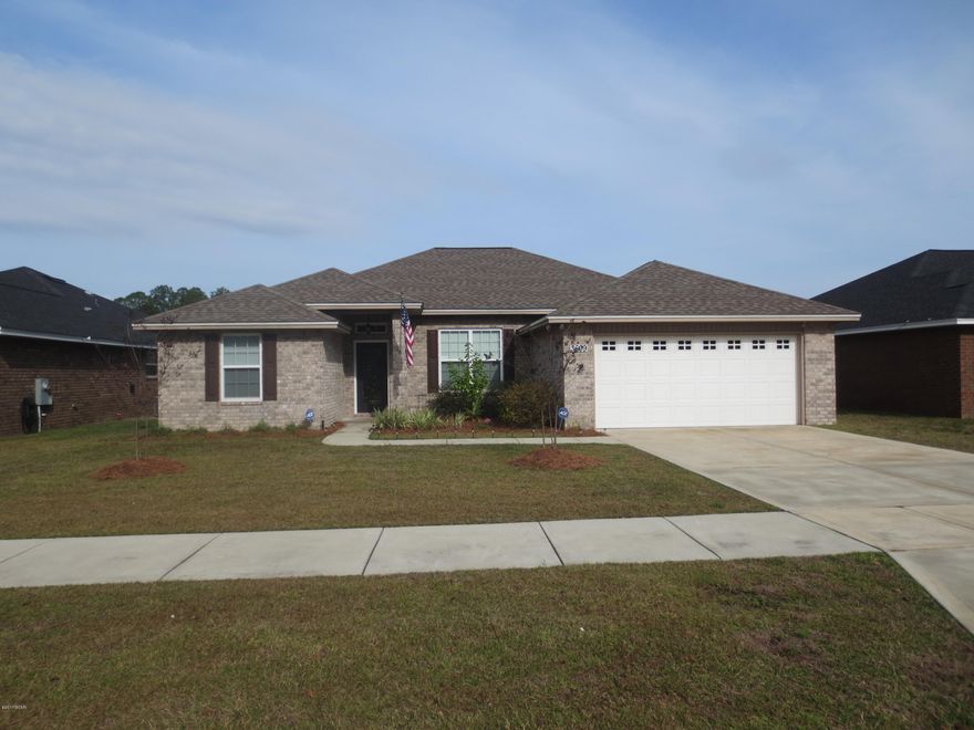 Newer all brick 4 bedroom home with a pool in Lynn Haven's Azalea Place Subdivision offering easy access to Panama City's main shopping corridor, Tyndall AFB, and the Naval Coastal Systems Base. Interior of home features, 10 ft. ceilings and wood flooring in living and dining room, granite countertops, glass natural stone tiled backsplash in kitchen, large island, and stainless appliances, master suite with tray ceiling, separate shower and Jacuzzi tub, double sinks, and 2 walk-in closet, recessed lighting, crown molding. 4 bedrooms and 2 full baths, one of the bedrooms has built in window seat and bookcases on either side of window and is currently being used as an office Exterior features all brick siding, two car garage, sprinkler system,covered screened in porch off living room leading out to the in ground gunite heated saltwater pool with LED colored lights. Neighborhood offers underground utilities and sidewalks. Call for your appointment today, this one won't last long.