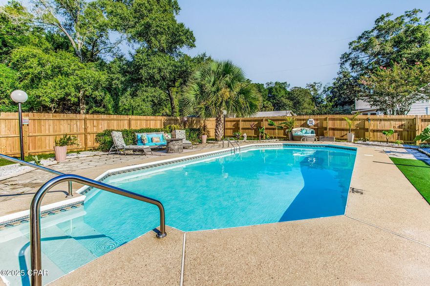 BACK ON MARKET! No fault of seller, now motived to MOVE THIS HOME WITH HUGE PRICE DROP!  Looking for something convenient to town, but quiet and peaceful? How about a charming Ranch-Style home on a spacious lot with a beautiful in-ground pool creating your own private oasis! 

Welcome to 403 N 73rd Ave — a fantastic opportunity for homeowners or investors looking to personalize a spacious 3-4 bedroom, 1 bath home nestled on a generous three-quarter acre lot in a quiet Pensacola neighborhood on a dead end road. Built in 1960, this home features a unique layout with two living areas (one currently being used as a bedroom), both with fireplaces to add to the charm!  

This home is the epitome of the Florida lifestyle with a screened in veranda and an in-ground pool for outdoor living.  The backyard is full of lush landscaping, exterior lighting, and a privacy fence around the pool, as well as a fully chain-link fenced lot. This home is ideal for relaxing or entertaining and would also be perfect as a vacation rental.  It even includes an RV hookup! 

Some of the new features that the owners have upgraded in 2025: New roof, new HVAC, all new electrical panel and breakers, wooden privacy fence, an irrigation system and a nice storage building.  

Interior upgrades have been made throughout as well, and the laundry room could easily be turned into a second bathroom and turning the patio storage room into the laundry area. There is plenty of potential to update and make it your own! 

With a solid structure, no HOA, and easy access to schools, shopping, and downtown Pensacola, this home is priced to sell and full of potential. Schedule your showing today!