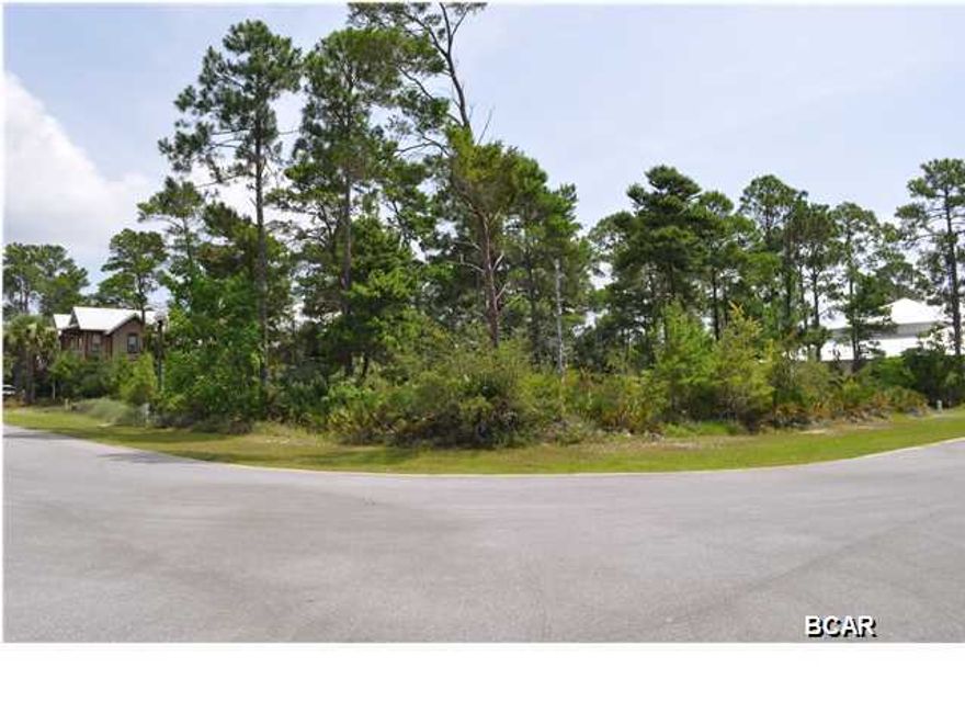 CURRENTLY UNDER CONTRACT, SELLER ACCEPTING BACKUP OFFERS.  This corner lot is located in Martinique, an exclusive gated community in east Panama City Beach. Bring your plans for your own coastal cottage and enjoy the natural beauty of this area. Martinique amenities include a large community pool, a children's playground, and a park pavilion that overlooks a lake. There is also a scenic walking trail that winds around and through the community. Martinique is only 5 minutes from the beach, St. Andrew's State Park, many award-winning restaurants, and several marinas! All info is approx. and must be verified by Buyers if important.