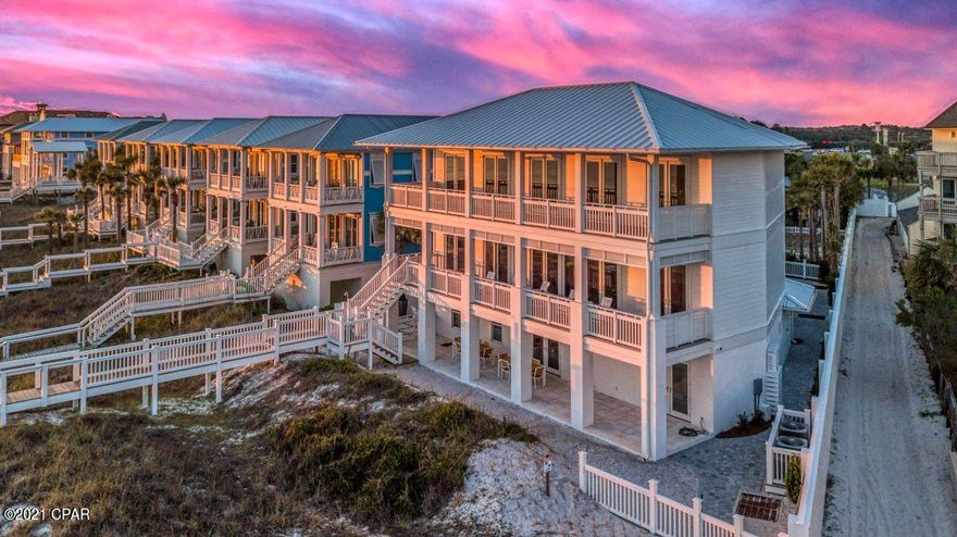 Bank Appraised this home for over list price! 

Spectacular house and guest house on a 140' beach lot in the gated community of Carillon Beach. Built in 2019, this is an investment property or a fabulous private family vacation compound  that will exceed your expectations. The property will accommodate 22 guests in its 8 bedrooms and 7 ensuite bathrooms, 3.5 powder rooms, private pool and over 3,900 linear feet of community beach stretching before you. No crowds in the sand on this beach. With over 6,000 square feet of luxury living and high-end amenities and 2,000+ sq ft of covered porches, this modern beachfront masterpiece is in a category all it's own. Main house and guest house can be rented together or independently and grossed over $370,000 last year during COVID restrictions. Management company's projections state this house will make over $450,000.