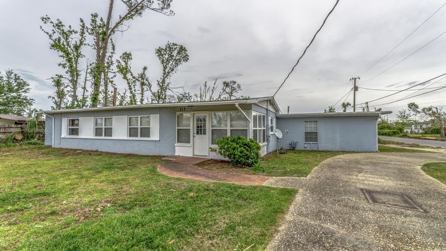 BLOCK HOME on a CORNER LOT in LYNN HAVEN! The interior of this home features 3 bedrooms, 2 full baths, a front Sun Room, a good size dining room open to the kitchen, a screened-in porch and a 1 car garage.  With all white interior paint, this home is a blank canvas waiting for you to customize to your taste.  The exterior features a new privacy fenced backyard, a 100x150 corner lot, and an open patio.  NEW ROOF and NEW HVAC!  This home is located 3 blocks to Porter Park which has a playground, picnic area, bridge access for fishing or walking and a boat launch.  Call today for a private preview.