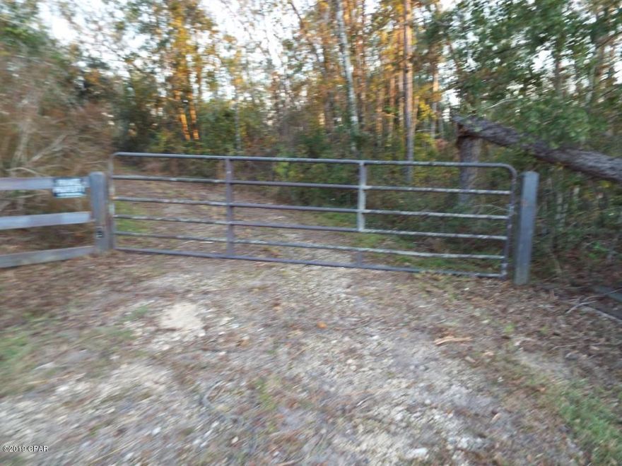 Rare investment or hunting opportunity!  113.33 acres with over 1000 feet on Highway 71 offered as is. The land has various vegetation on it and an old damaged single wide mobile home and a 30 by 50 feet garage with loading door. Total of all sizes are approximate and taken from other sources please verify accordingly.