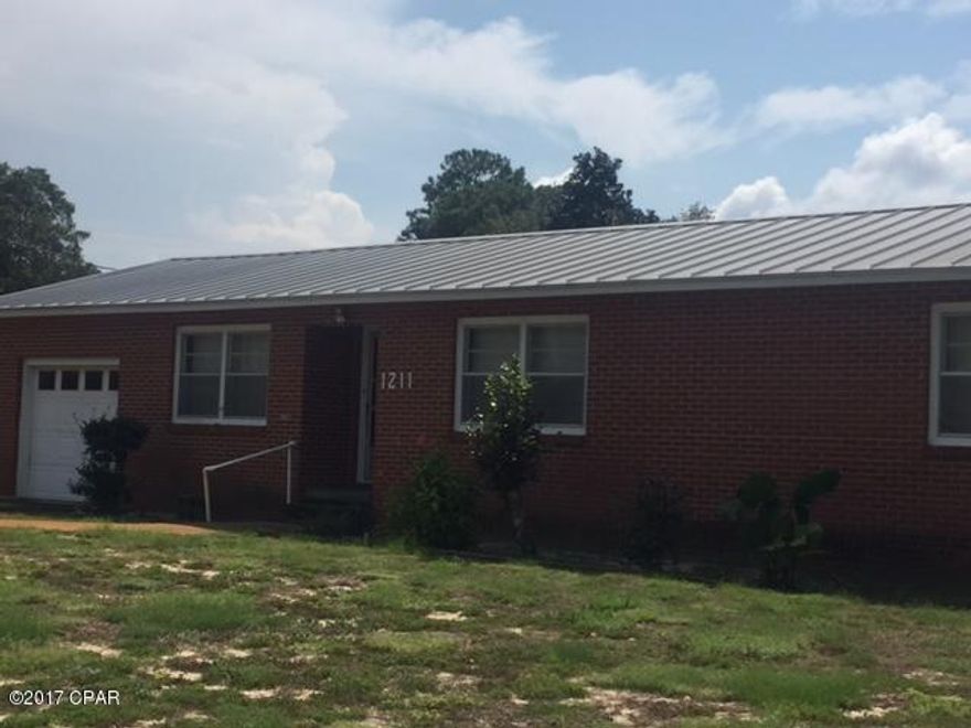 This one owner brick home has been well maintained, located in a great neighborhood on a large corner lot. Electrical panel & plumbing have been updated and the home has a metal roof. There is a 120' well for watering your lawn plus newer water heater, and stove.. We believe there is real wood floors under the carpet that needs to be replaced. There is a two story out building and home is in X Flood zone, no flood Insurance required.