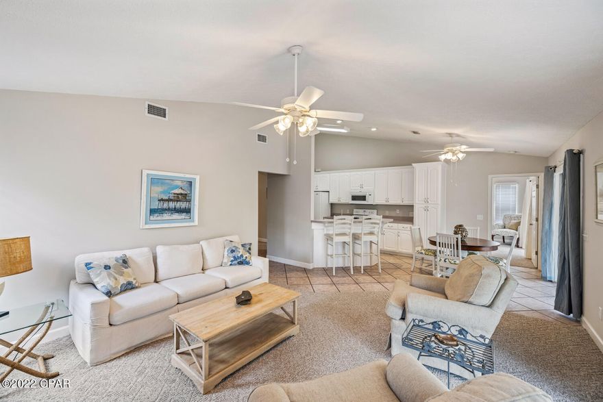 PROPERTY CURRENTLY UNDER CONTRACT SELLER ACCEPTING BACKUP OFFERS.Our new favorite home in Riviera Beach! This wonderful home has many great features, such as an open floor plan with lots of natural light and a large master suite with its own sliding glass door that opens to the screened-in porch. There are three sets of sliders in the dining/living area that open to the oversized (40x10) screened-in porch. The outside features a stunning patio with pavers, a beautifully landscaped yard, a freshly painted exterior, and a new metal roof. The golf cart-friendly area of Riviera Beach has a remarkable sense of community, sunset gatherings, & more. The location is fantastic! Minutes to Pier Park (shopping, movie theater, restaurants), Carillon Beach, the 30A corridor. Come see this charming home