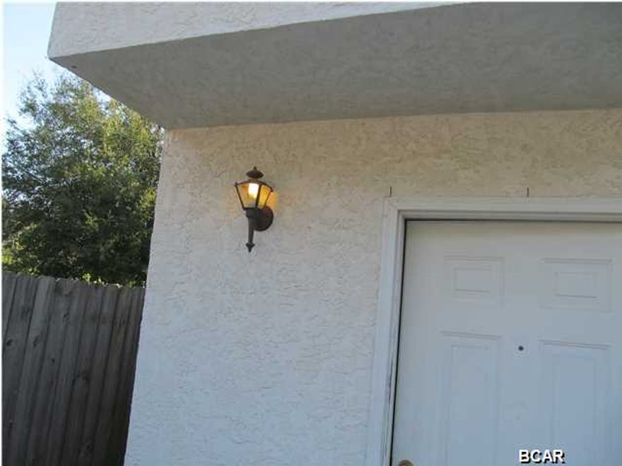 2BR 1.5Ba 2 story townhome in St. Andrews with stackable washer & dryer, open patio and side yard with privacy fence.