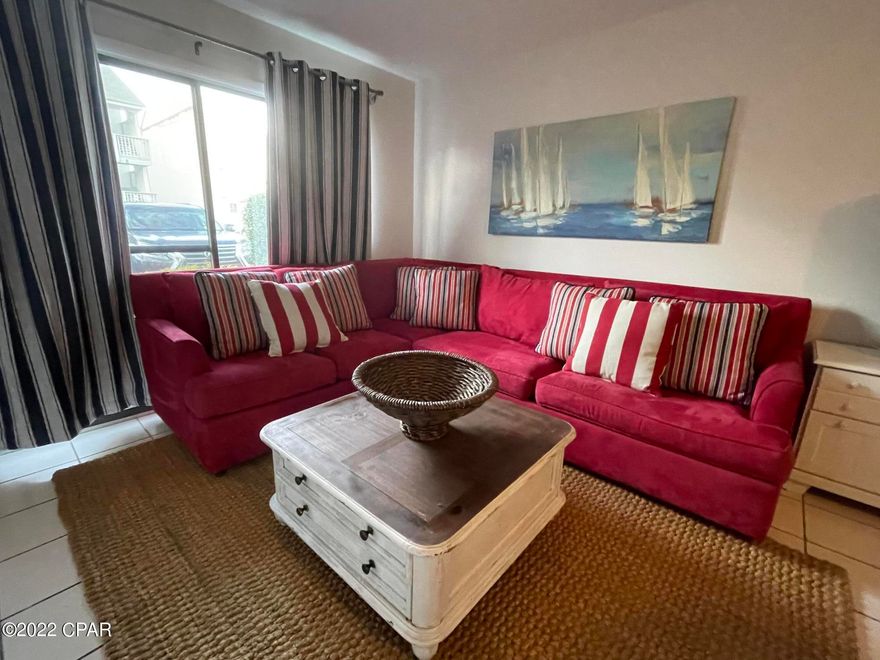 OWNER FINANCING OPPORTUNITY! Fantastic option for a 2bd/1ba cozy unit on the Ground Floor at Endless Summer - The BEACH access is 75 steps away from your doorstep !!  Just redecorated, freshly  painted + new stainless appliances - comes completely turnkey furnished! Two bedrooms + a queen sofa sectional sleeper - sleeps up to 6 people.  This condo is currently on the Vacation Rental program.  Park in front of the unit & walk in the front door - no steps, no elevators, no crowds! On site laundry facilities, low rise complex with 2 swimming pools, a spa & outdoor grills.  Only 3 miles to Pier Park & close to 30A & South Walton.  Short & long term rentals allowed - owner's Pets are allowed. On-site HOA Management company, Low HOA Fees - A MUST SEA!