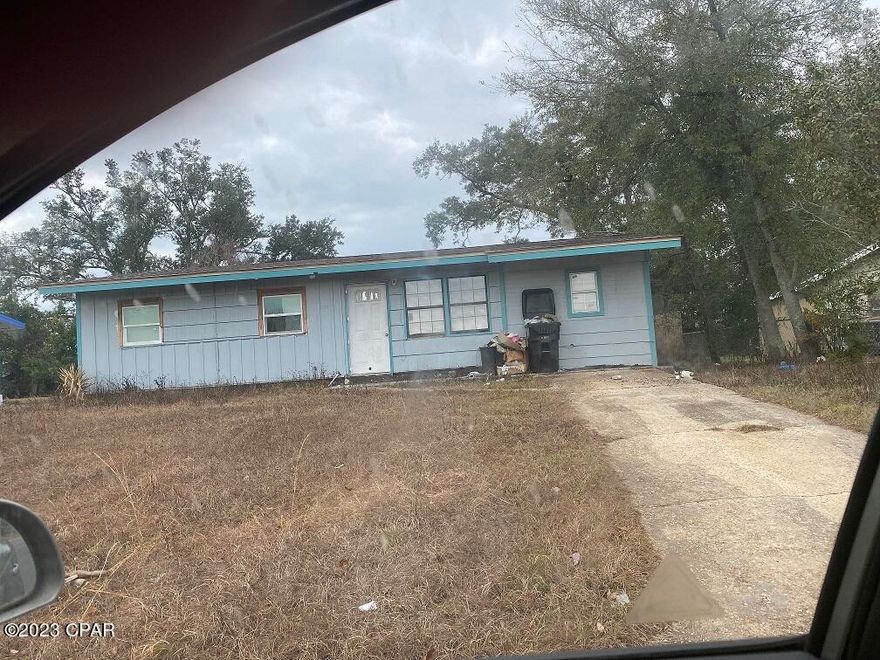 This property is sold in as is condition. This is a 3bedroom 1 bath home with the garage/carport area converted for additional living area. The home needs work.  All info taken from appraiser site & sizes are approx., Buyer to verify.