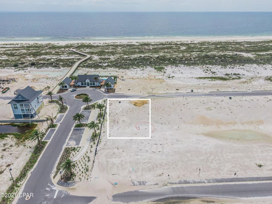 AMAZING 1ST TIER CORNER LOT WITH GULF VIEWS in Sugar Sand, a gated Gulf front community in Mexico Beach! Sugar Sand is an upscale community nestled between Panama City Beach and Port St. Joe. With low HOA fees and a 3 year build out time, this is the perfect opportunity to build your dream beach home. Gulf front lots are restricted from building higher than 35 ft, however Lot 49 can build up to 48 ft high which means you can still enjoy Gulf views from a higher floor. This large lot sits high & dry on the bluff with beautiful natural surroundings and is conveniently located across the street from the community clubhouse & pool. The 15 ft wide boardwalk offers full golf cart accessibility all the way to the pristine beach along the emerald green & crystal blue waters of the Gulf of Mexico. This is a prime lot location! With the beach boardwalk just across the street next to the clubhouse, you are just a short stroll or golf cart ride away from the beautiful white sand beach. Sugar Sand offers a peaceful setting for owners & guests with no thru traffic nor crowded beaches. The community clubhouse offers a zero entry gulf front pool, fitness center, banquet facility, and plenty of green space to enjoy fun activities on the lawn. Ideally located between Panama City Beach and Port St. Joe means you are just a short drive away from all the attractions that these desired areas have to offer, yet you can relax and enjoy the privacy of being tucked away in a serene, beachfront community. Enjoy outdoor activities such as kayaking and paddle boarding, a great way to explore the Gulf of Mexico! Take your boat over to Crooked Island for world-class fishing or visit the fantastic restaurants and shops in historic downtown Port St. Joe. Sugar Sand is amid Florida's finest beach communities, restaurants, and recreational activities, with quick access to it all. This is an incredible opportunity to build your very own private oasis, second home, or rental investment!