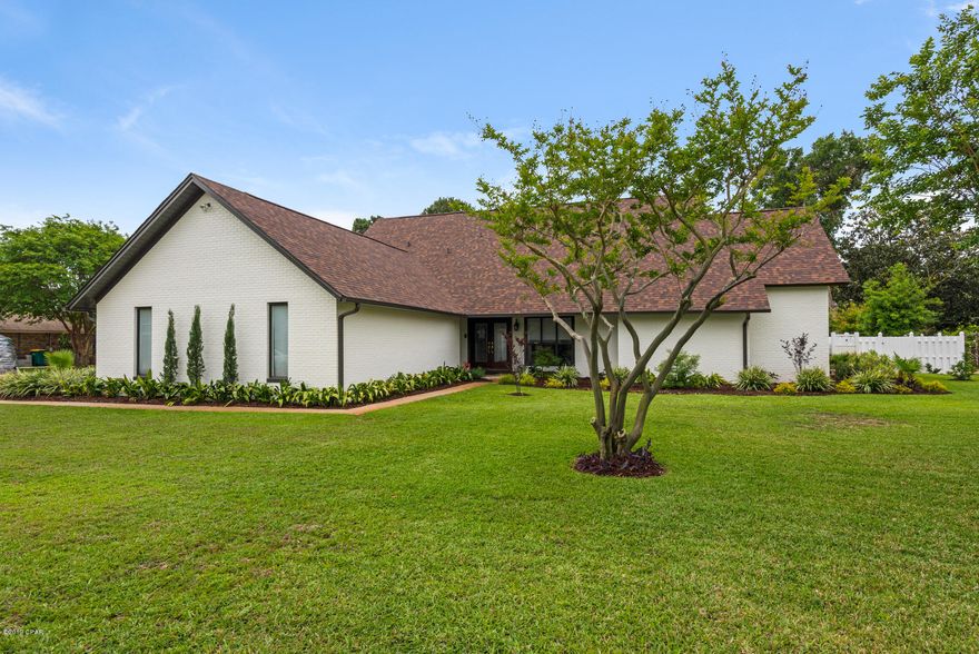In the fantastic neighborhood of Indian Bayou Golf & Country Club sits a beautifully renovated home.Immaculate landscaping! New roof , New exterior paint, New ceramic tile(woodgrain),New paint interior, New carpet upstairs all in Mar 2018, New lawn pump and upgraded sprinkler heads in Feb 2019,updated bathroom and kitchen fixtures,Generac home generator, and 2 AC units and 2 hot water heaters that have been serviced and capacitors replaced. Lush private courtyard with a raised vegetable or flower beds and inground fire pit.Fruit producing grapefruit, orange,lemon and fig trees in the backyard! Entire back of the home is glass doors giving you great pool and golf course views. The screened pool enclosure covers  the entire back of the home including covered lanai.