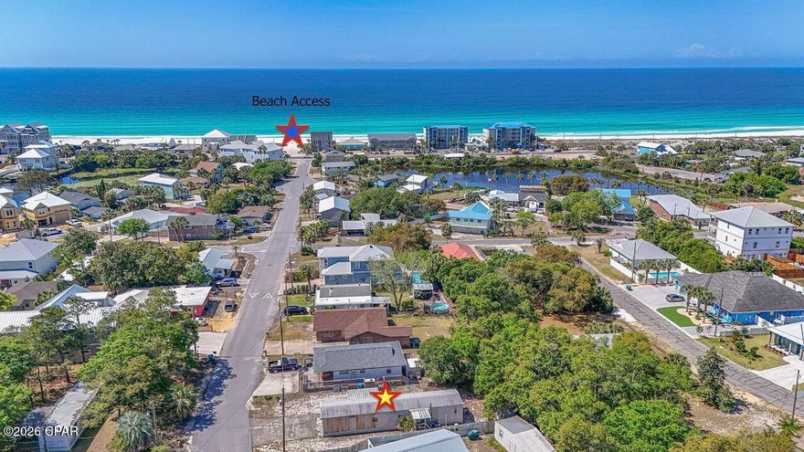 Just over a block from the beach, this 2-bedroom, 2-bath mobile home offers coastal living with water views right from the front yard. Enjoy the convenience of being only moments from your doorstep to the sandy shoreline. The home features a covered porch perfect for relaxing, a two-car driveway, and an outbuilding for extra storage. Whether you're looking for a weekend getaway, investment property, or the perfect spot to build your dream home with a beach view, this property presents an exceptional opportunity to own a slice of coastal paradise.