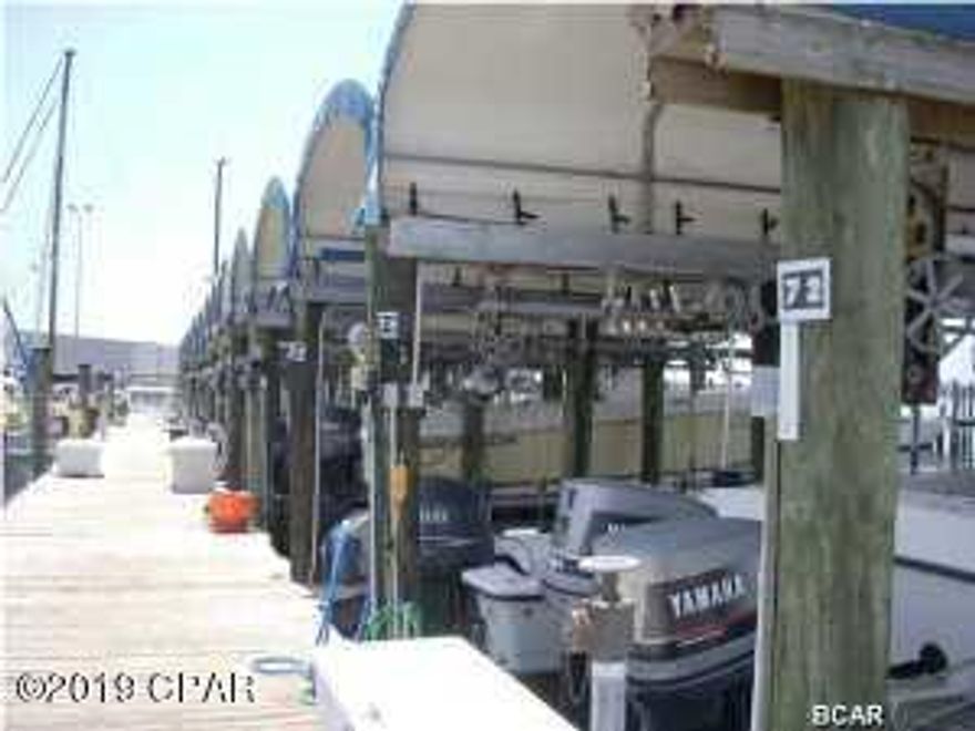 Covered boat slip close to the open gulf.#82 will hold up to 23' boat. Located on a land lease.
