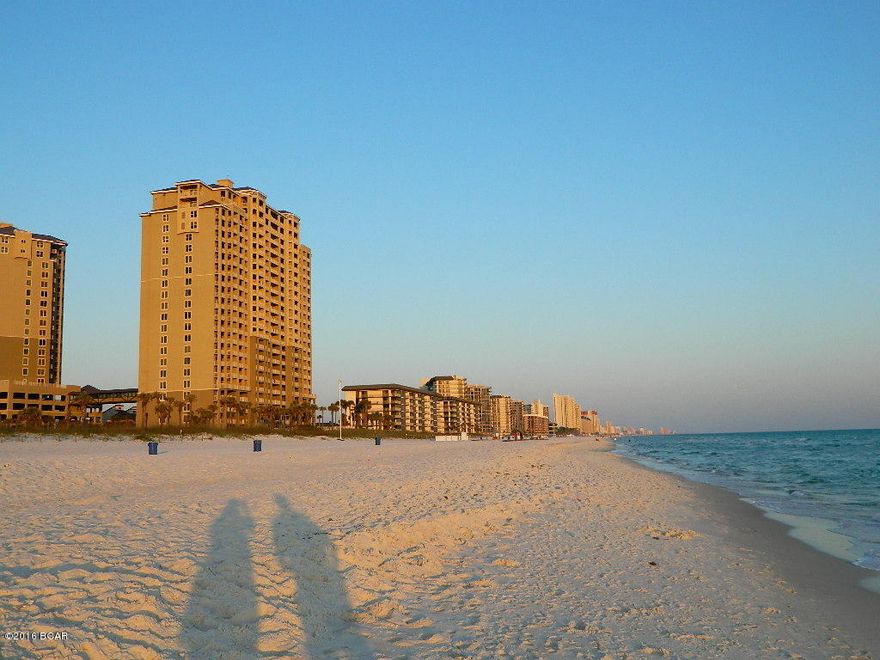 Gulf-Front condo for sale at Grand Panama Beach Resort in Panama City Beach, Florida. Endless beach, water and sunset views. Popular waterfront master suite with large bedrooms and bunks sleeps 8 comfortably. Offered fully furnished, new carpet, fresh paint, new bedding. You will love the designer décor and finishings. Kitchen upgrades include stainless appliances, granite counters, tile backsplash, 20'' tile flooring. Master bedroom opens to the private balcony and features a king bed, flat screen TV, en-suite bath with soaking tub, separate walk-in shower, double vanity. Amenities include Gulf-Front Pool and Hot Tub, Terrace Pool, Gym, Owner's Lounge. Central location walkable to dining, shopping, entertainment. Short tram ride to Pier Park! 4Q good time to buy. Come find your beach!