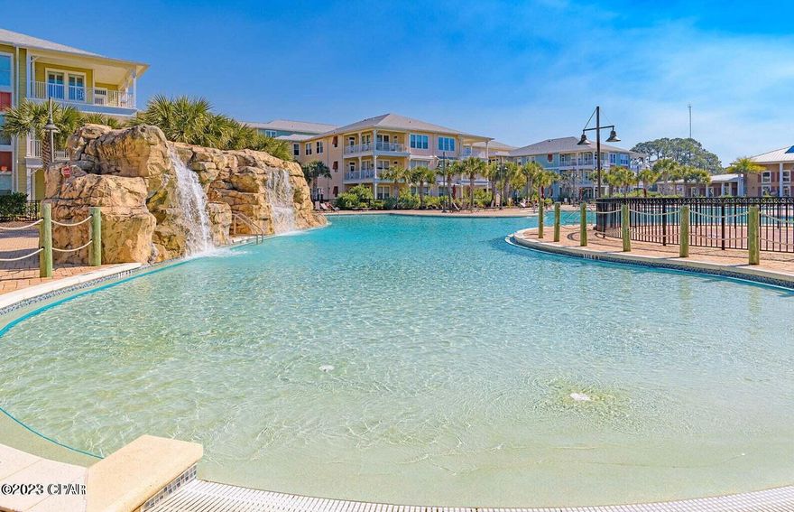 Immaculate!  One of Nicest homes in the gated community of Island Reserve, Totally updated and in pristine condition, Being sold with furniture. High end appliances, new HVAC and water heater less than 2 yr. old. Pull out wooden drawers in kitchen. List of many Updates in the documents too many to list! A true MUST SEE. Lagoon style pool with waterfalls, hot tub, pickle ball and basketball in gym, state of the art exercise equipment, game room, theater room, beautiful courtyards with fountains and so much more. Close to the beach, restaurants, and shopping. You can drive up to your floor, End unit  First condo off parking garage Easy access for groceries, etc. . Also, elevators are in all buildings too. Fantastic social committee keeps owners connected with get-togethers around the pool as well as holiday events!  No short term rentals, but long term rentals are possible, (6 mos or longer)