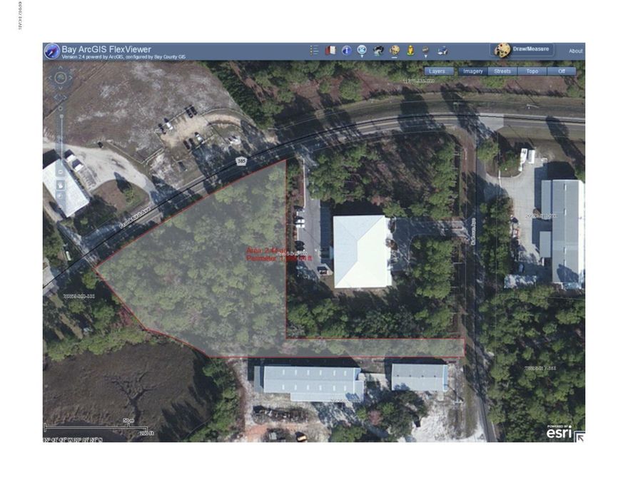 Waterfront commercial lot in central Bay County. Property is located near former Northwest Florida International Airport which is currently being redeveloped into Sweet Bay Residential Community. Zoned industrial.