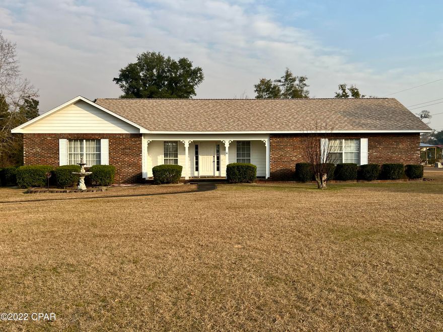 CURRENTLY UNDER CONTRACT, SELLER ACCEPTING BACKUP OFFERS  Location counts! Here is the right home for the right price. Come see this 3/2 brick home with split bedroom floor plan.  Large great room with fireplace, with combined dining rm., kitchen with lots of cabinets, SS appliances, inviting Florida room with big windows for a nice view. one of the bedrooms has an office space built in.  Laundry room with cabinets, spacious master bedroom with 2 separate closets and on-suite master bath.  Attached 2 car carport with an attached 2 car garage with extra storage up top.  Beautiful large oaks in the backyard for summer relaxing.  Make your appointment today.