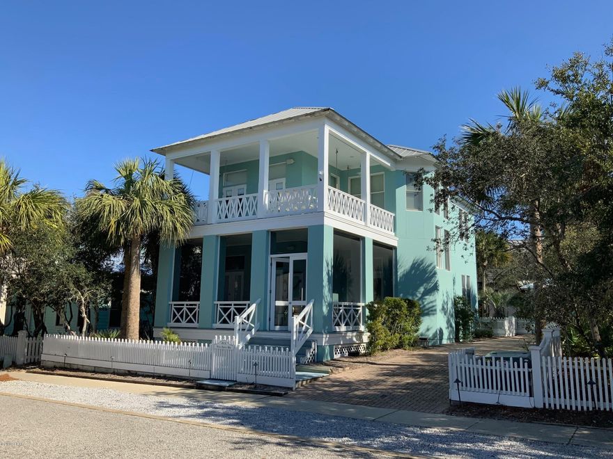 This stunning beach house located on the coveted Dunecrest Lane, just two houses away from the beach access, has been completely renovated and professionally decorated! It has a vast wrap around porch, a shed, a great backyard with a fantastic sitting area and room to build a guest house! Once entering this immaculate coastal haven, you will notice the grand staircase with that eye catching architectural element, the fabulous wood flooring throughout, the luxurious furnishings and the high end Jenn Air appliances in the kitchen! There is also a guest bedroom that shares a Jack N Jill bath on this floor. Once upstairs, there is a guest bedroom, bunk room and an opulent master with balcony and a master bath with a Victoria & Albert free standing tub! This is the ultimate beach living!