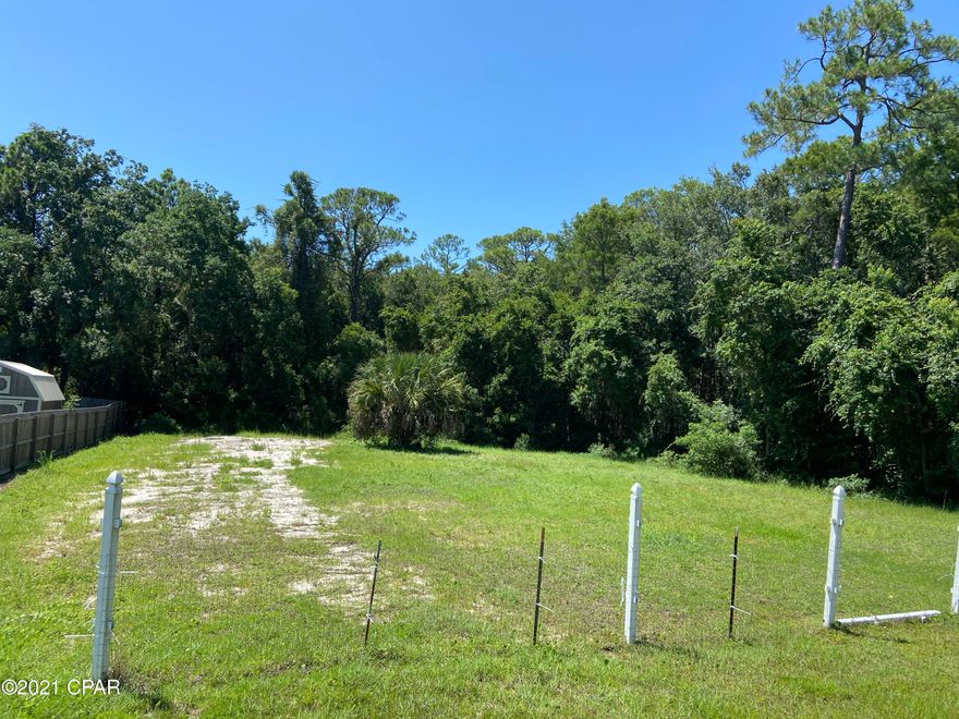 Large lot, already cleared and mowed just waiting for your beach home to be built. N. Lakeshore Drive is located North of Back Beach Road and because it is a  ''dead end'' street, so there is no thru-traffic to deal with and No HOA!  This residential lot offer plenty of space for a larger home, in-ground pool and even to store your Boat. The beautiful sugar white sands beach  is only a 4 minute drive away.