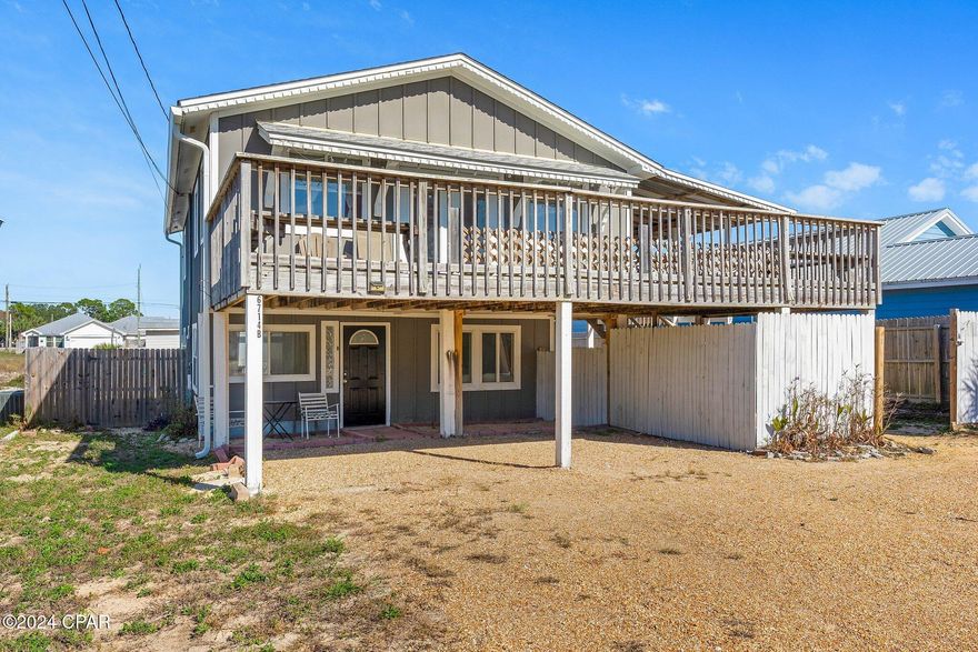 This charming upstairs 2-bedroom, 1-bath unit offers everything you need for a comfortable coastal lifestyle, within walking distance to Beach Access 12, perfect for enjoying the sun and sand. Rent includes water and electricity. Don't miss this rare opportunity to live close to the beach in a furnished space with utilities included!