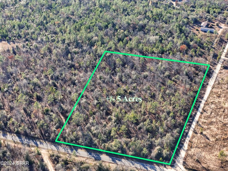 An exquisite 5-acre estate, segmented into two parcels of land awaits your creative vision, perfectly suited for either a residential retreat or an investment opportunity. Nestled in Flood Zone X. No HOA fees. More interestingly the excitement of the new North Florida Motorplex racetrack located less than a 1/2 mile from your future estate. All Information is deemed to be reliable, but is not guaranteed, buyer to verify if important. Call today for more information.