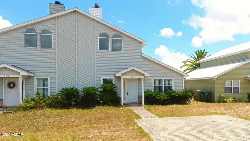 CURRENTLY UNDER CONTRACT, SELLER ACCEPTING BACKUP OFFERS...............THIS IS IT...MOVE-IN READY...PRICED TO SELL 3-bedroom 2 bath townhouse in Lynn Haven! The family room is light and airy with large windows to allow for plenty of natural light, vaulted ceiling and corner wood burning fireplace. The spacious kitchen features a breakfast bar and plenty of cabinets. The full-size laundry room off of the kitchen leads out to the back covered porch/patio area and large privacy fenced-in yard. The two guest bedrooms are located on the main floor and a full bath. The master bedroom is the only room on the second floor with plenty of space, two walk-in closets and has its own full bath. This home is located near schools, parks, restaurants, shopping, and more. Great Location and Excellent Price