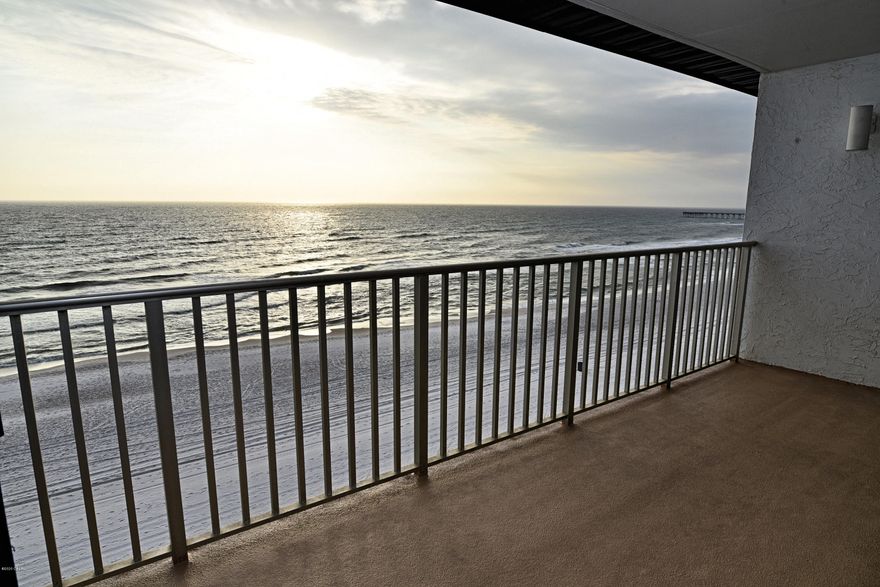 Imagine a beach get-a-way of your very own that earns rental income when you're not there! This spacious condo is on the top floor and right on the sand! Features several updates! Granite, stainless. Upgraded baths, walk-in showers. New doors, coastal colors.  Waterfront Balcony. Enjoy the many benefits of a Full-Service Resort including tropical lagoon pool, heated pools, hot tubs, sun decks, Oceans Restaurant & Bar, Market, Pizza Shop. Owners enjoy unlimited Golf, Basketball, Tennis,  Shuffleboard. Fitness Center & Salon Services. The Kids Adventure Club keeps them happy with splash pad, special events, activities calendar. Secure, manned gated entrances. On-property tram service. Walk to restaurants, shops, entertainment.