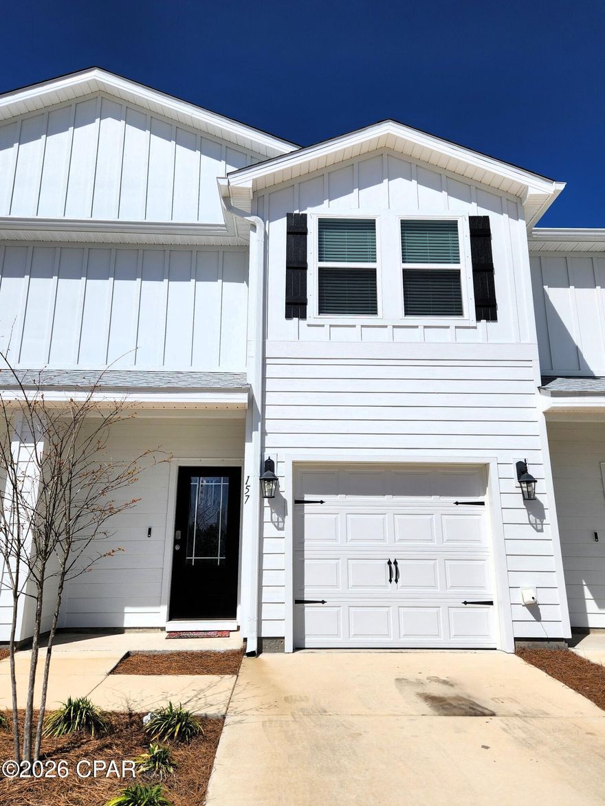 Virtually New Townhouse for RENT off Hwy 79 in Panama City Beach, FL.  Half off 1st Month's rent if Lease is signed and starts by April 1, 2026!  
Built in June 2025 this townhouse is located in the heart of Panama City Beach just off Highway 79, only about a mile from the new Hospital being built, less than 3 miles to the sandy white beaches and a 10 min. drive to the Northwest Florida Beaches International Airport (ECP). This townhome has 3 bedrooms, 2 1/2 bathrooms, and a 1 car garage. This is a smart-home that offers smart thermostat controls,  remote front and back door locks, the garage door can be remotely accessed plus more! Wired for an alarm if you want that feature added to the smart home. The driveway allows for 3 cars and a single car garage for a total of 4 car capacity. All bedrooms are located on the 2nd floor. The main level is great space for entertaining and relaxing. The Kitchen includes white cabinetry and Ivory with granite countertops. There is a breakfast bar island with stainless-steel sink, and stainless kitchen appliances which includes a Refrigerator, an electric stove, a microwave, and a dishwasher. The main living area and stairs, has easy to maintain, luxury vinyl plank flooring, and the 3 bedrooms upstairs have carpet. Ward Creek offers a Swimming pool, Playground and outdoor space for residents. This modern home offers comfort, convenience, and is perfect for professionals, families, or anyone looking to enjoy all the beach life has to offer.