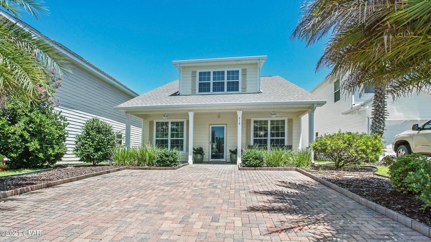 CURRENTLY UNDER CONTRACT, SELLER ACCEPTING BACKUP OFFERS Immaculate home located on the beautiful west end of PCB. This house has it all! Walking in you'll immediately notice the beautiful wood floors, crown molding & spaciousness of the home. The front windows provide lots of natural light. Down stairs boasts a living room, formal dining room, huge kitchen w/quartz counter tops, breakfast area, large bedroom & full bathroom. Up stairs you'll find the laundry room & two other bedrooms each w/attached full baths. All bedrooms are very spacious & have amazing closet space. You'll love the main bath featuring a soaker tub, double sinks & walk-in tile shower. Outside you'll enjoy the comfy oversized front porch & the fully fenced back yard featuring a paver patio, garden shed & beautiful lands