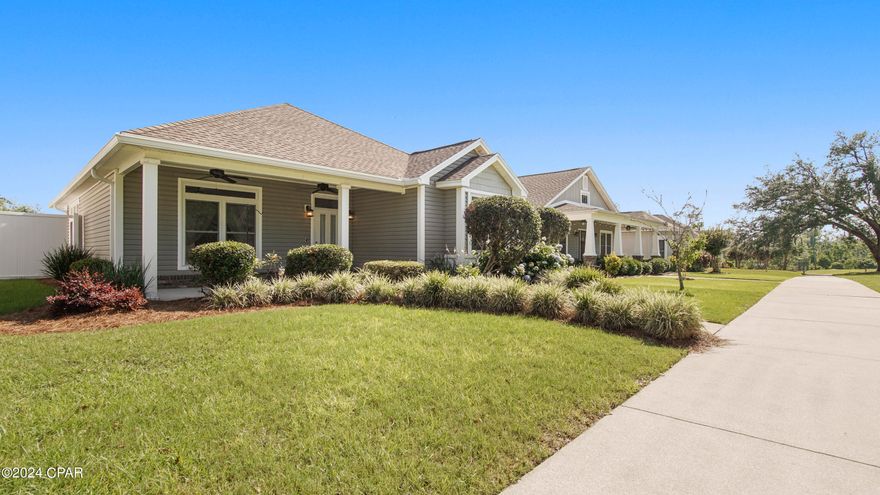 Currently Under Contract; Seller will consider backup offers. ***BAY CO.'S BEST KEPT SECRET!!!*** Riverside is an amazing, storybook neighborhood that can easily be featured in the pages of ''Southern Living Magazine!'' This charming Craftsman-style home is nestled in the heart of Panama City--close to both charter schools, the new Publix shopping center, and just minutes to downtown Panama City, Tyndall Air Force Base, Lynn Haven, and our beautiful beaches. The community is reminiscent of a bygone era, where folks are friendly, residents can enjoy a morning or evening stroll along the sidewalks and paths, leisurely linger on their porches, children can safely enjoy the common areas, and so much more! It features immaculate landscaping, extensive walking paths, a community room, a fitness center, a neighborhood pool, a picnic pavilion, a basketball court, a playground, and even a fishing dock and kayak launch on beautiful Mill Bayou! This well-designed home offers a perfect blend of comfort, style, and convenience with a welcoming, open-concept layout, tons of natural light, and high quality construction materials such as true hardwood floors, an upgraded kitchen with solid surface countertops, custom cabinets, stainless steel appliances, a spacious walk in pantry and a built-in nook that would make a fantastic coffee bar, wine bar, or office area. There are 2 Master Suites, both with private bathrooms, and the larger with a spacious walk-in closet. From the dining area, French doors lead out to a beautiful and private outdoor oasis, fully fenced with a covered porch--the perfect spot for grilling, dining al fresco, or gathering with family, friends, or pets. Another welcoming surprise is the large screened in porch accessible from the kitchen, courtyard, or garage AND an additional covered porch on the front of the home that overlooks the scenic common area! An oversized 2 car garage allows for extra storage and plenty of parking. If you are looking for a fantastic home that maximizes living space both indoors and out in a neighborhood with incredible amenities, be sure to put this one on your list. CALL TODAY TO SCHEDULE YOUR PRIVATE TOUR!
