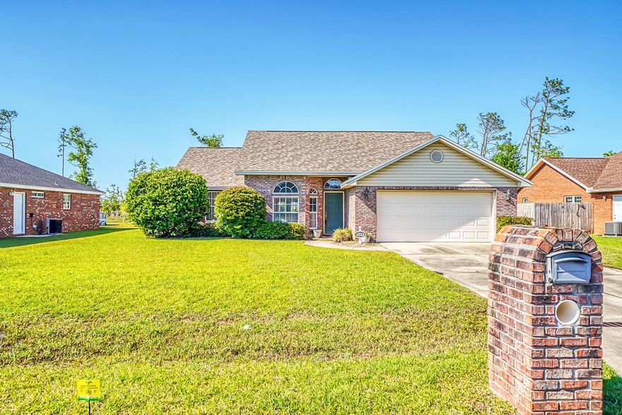 UNDER CONTRACT, ACCEPTING BACKUPS. Here's your chance to own a wonderful home in a quiet neighborhood! Exterior features include well maintained landscaping, oversized 2 car garage, brick exterior, covered patio and an awesome backyard. No HOA plus room for a boat. Once inside, notice the well maintained kitchen with pretty oak cabinets, moving on to the living and dining area, you'll love the fireplace, cathedral ceiling, and crown. The split floor plan provides 2 bedrooms with a full bath, and the master bedroom offers a spacious master closet. A feature that the new homeowner will love is the whole house generator!  With new carpet and a fresh coat of paint, this Lynn Haven address can be the perfect place to call home!