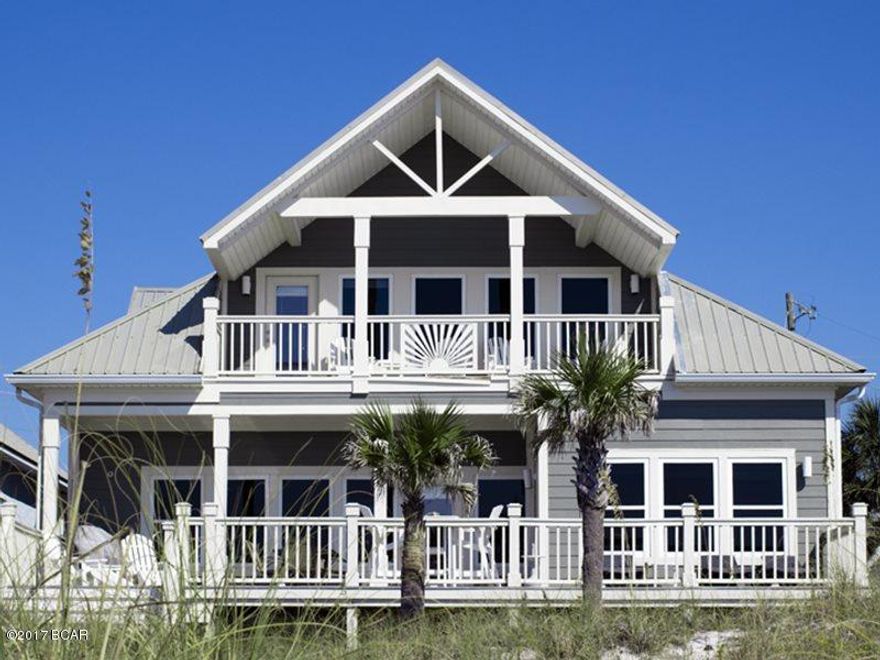 Completely remodeled, this house was completely gutted and rebuilt .  A stunning rehab that gives you a touch of 30A with professional décor by Coastal Charm. Acquired age by recent appraisal is 2018.  Over 700 square foot was added and a  swim/spa, new cabinets, shiplap interior, new HVAC, new cabinets and countertops, all new flooring and all new furniture.  In addition, new roof, paint and new paver driveway and landscaping.    The West End of Panama City Beach is the new 30A  and this house is centrally located west of Hwy 79, close enought to enjoy Pier Park but far enough to have some privacy. Fully Furnished & tastefully decorated non rental.     Features 2 Master bedrooms, 4 additional large bedrooms, 5 baths, 2 decks and a 50' lot right on the beach A must see, you need to put this on your list.