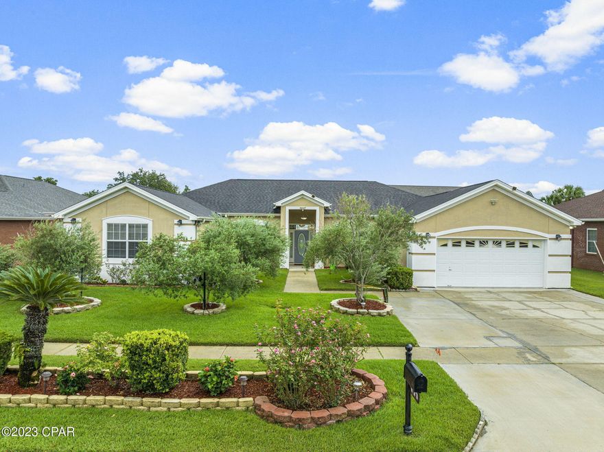 Looking for a beautiful upgraded home central to just about everything in town and located in a quiet neighborhood surrounded by a protected preserve. Convenient to Navy and Air Force bases, both Hospitals, shopping centers and beautiful emerald beaches. Located in Lynn Haven. This gorgeous home features 4 bedrooms, 2 and half updated bathrooms, and an extra office/library. When you enter the home, you will be greeted with a beautiful marble flooring formal living room, a formal dining room and an office/library. As you continue down the hall you will find the spacious updated master suite that offers two walk-in closets, dual vanity, garden tub, a separate shower.  On the opposite side of the home, you will find 3 other spare bedrooms with all updated new carpet, new painted walls and ceiling, new painted baseboards, and new painted doors with new hinges all throughout the house and with an updated bathroom. The kitchen is open to the breakfast room with updated cabinets and has attractive granite countertops, a deep double sink. The exterior features a large privacy fenced backyard that is enough space to add a large pool for family and friends. The exterior yard has been updated with new sprinkler system and new grass that adds to the appeal of this property. Schedule your private showing today and request for the seller's sheet provided on the MLS with all the updates for this house.  All sizes/measurements are approximate; please verify if important.