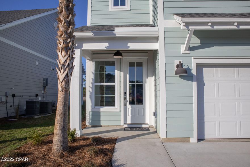 Move-in Ready Home!  Breakfast Point East is now selling! Live within 2.5 miles of ''The World's Most Beautiful Beaches''.  This 5-bed 3.5 bath Key Largo plan by Truland Homes offers all the upgrades that will allow you to enjoy your beach retreat.  Interior features 9-foot ceilings on both floors with 8-foot-tall doors, tile/EVP flooring, granite/quartz countertops, gas stove, and stainless-steel appliances.  Exterior features cement board siding, hurricane fabric, and full yard landscaping.  The new section of this community is close to shopping, restaurants, and the new medical facility on Hwy 98.  Photos are of another like plan and may finishes may vary.